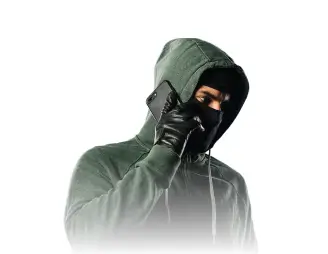 Hooded and masked individual holding a phone, representing a scammer or fraudster making a deceptive call.