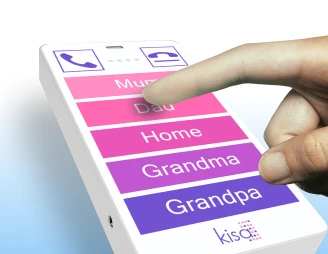 A hand pressing a button on a KISA Phone labeled 'Mum,' 'Dad,' 'Home,' 'Grandma,' and 'Grandpa' in bright shades of purple and pink for easy accessibility