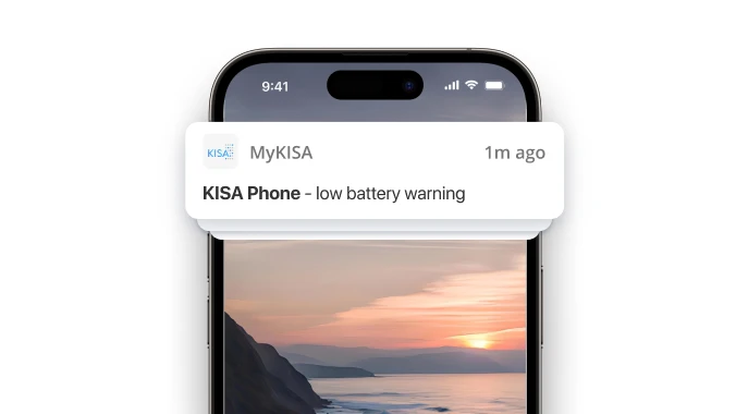 Smartphone notification displaying a 'low battery warning' from the MyKISA app for a KISA Phone