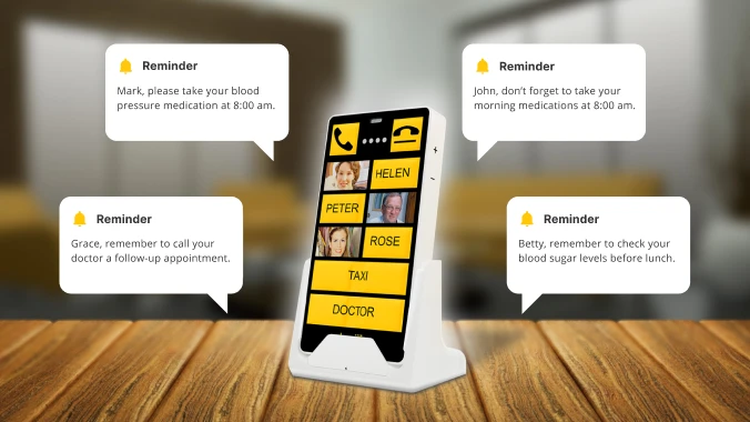 KISA Phone on a desk displaying multiple reminders for medication and doctor appointments.