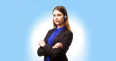 Confident customer service representative wearing a headset and business attire, ready to assist