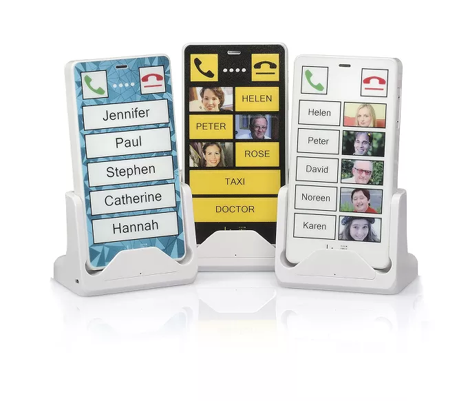 Three KISA Phones on display, each programmed with large, easy-to-read contacts for Jennifer, Paul, Stephen, Helen, and others, along with services like Taxi and Doctor