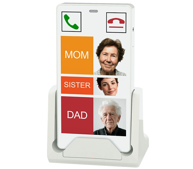 KISA Augmentative and Alternative Communication Device on the KISA cradle displaying family contacts with photos labeled MOM, SISTER, and DAD