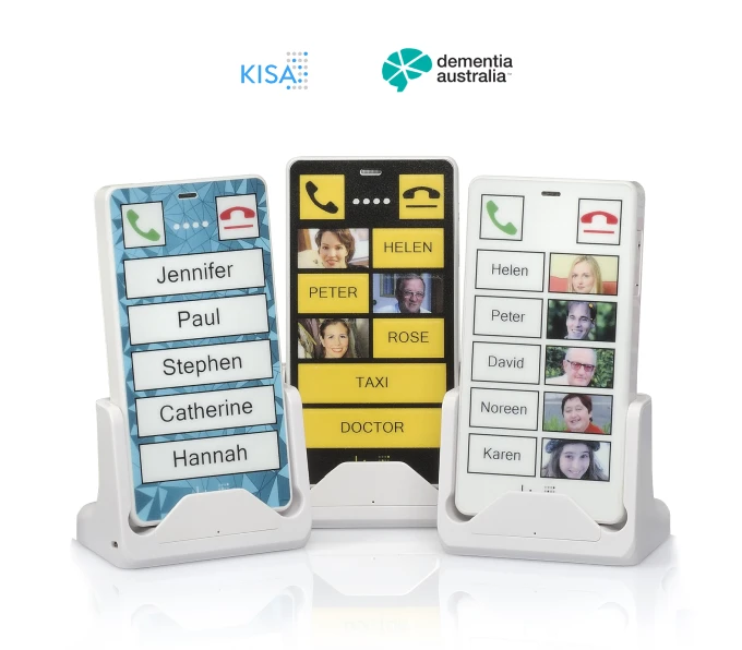 Three KISA Phones on display, each programmed with large, easy-to-read contacts for Jennifer, Paul, Stephen, Helen, and others, along with services like Taxi and Doctor, endorsed by Dementia Australia for accessibility and simplicity